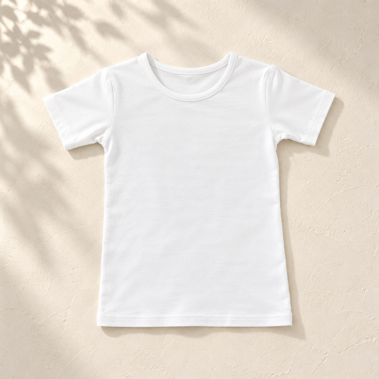 Boys white short-sleeve ballet top flat lay
