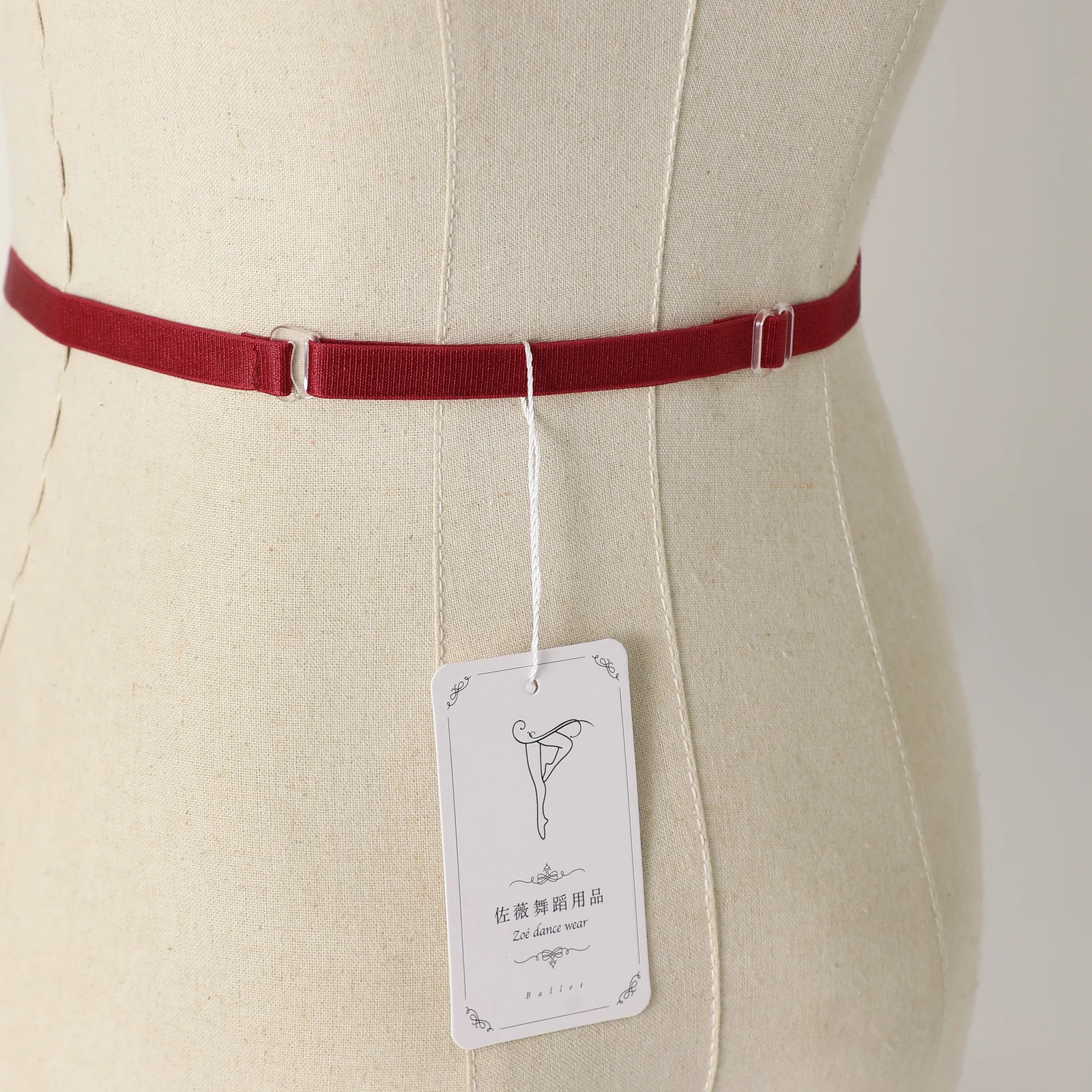 RAD examination ballet elastic belt worn on a mannequin, front view