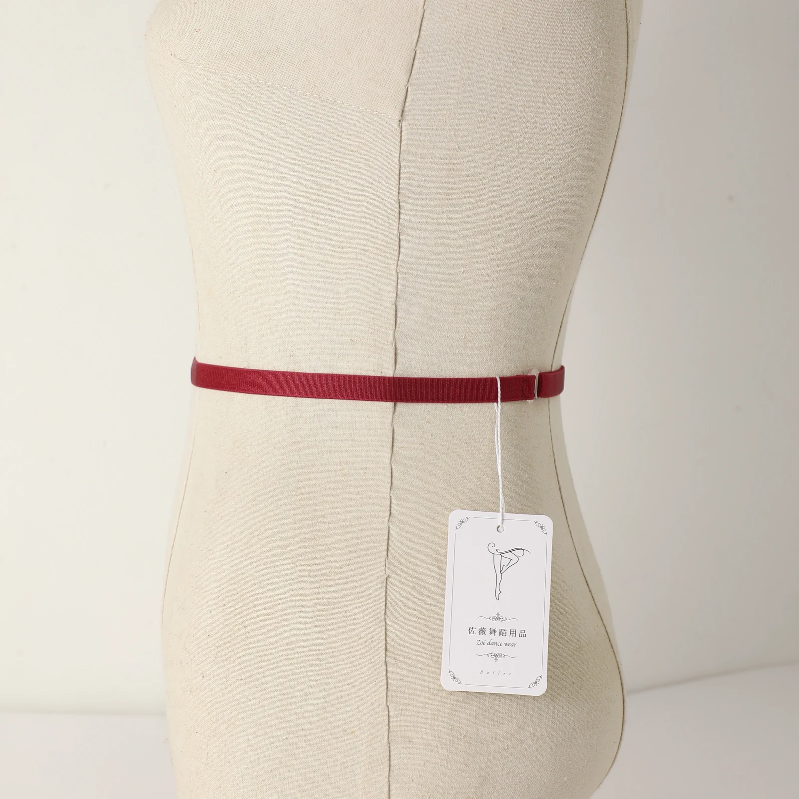 RAD examination ballet elastic belt worn on a mannequin, side view