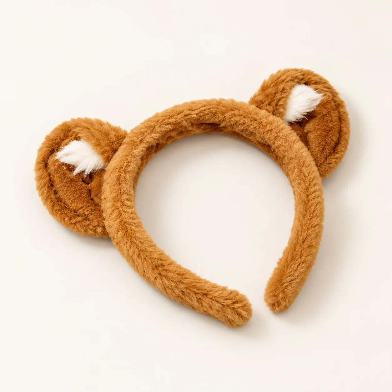 Plush brown bear ear headband with small white inner ears