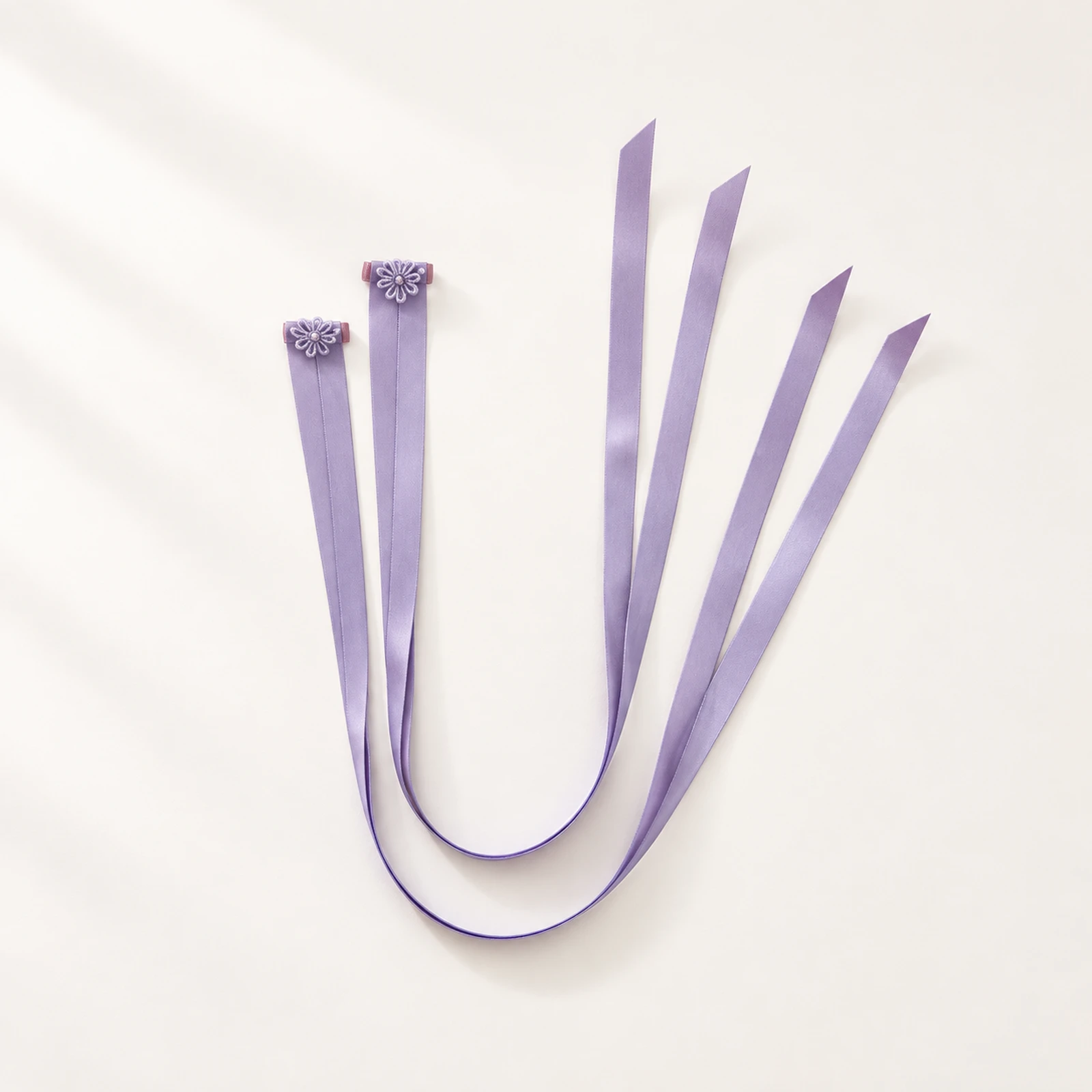 Pair of mist lavender satin finger ribbons with small flower loops