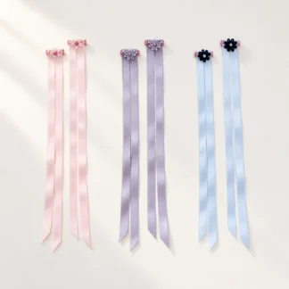 Three pairs of satin finger ribbons in blush pink, mist lavender and pale blue