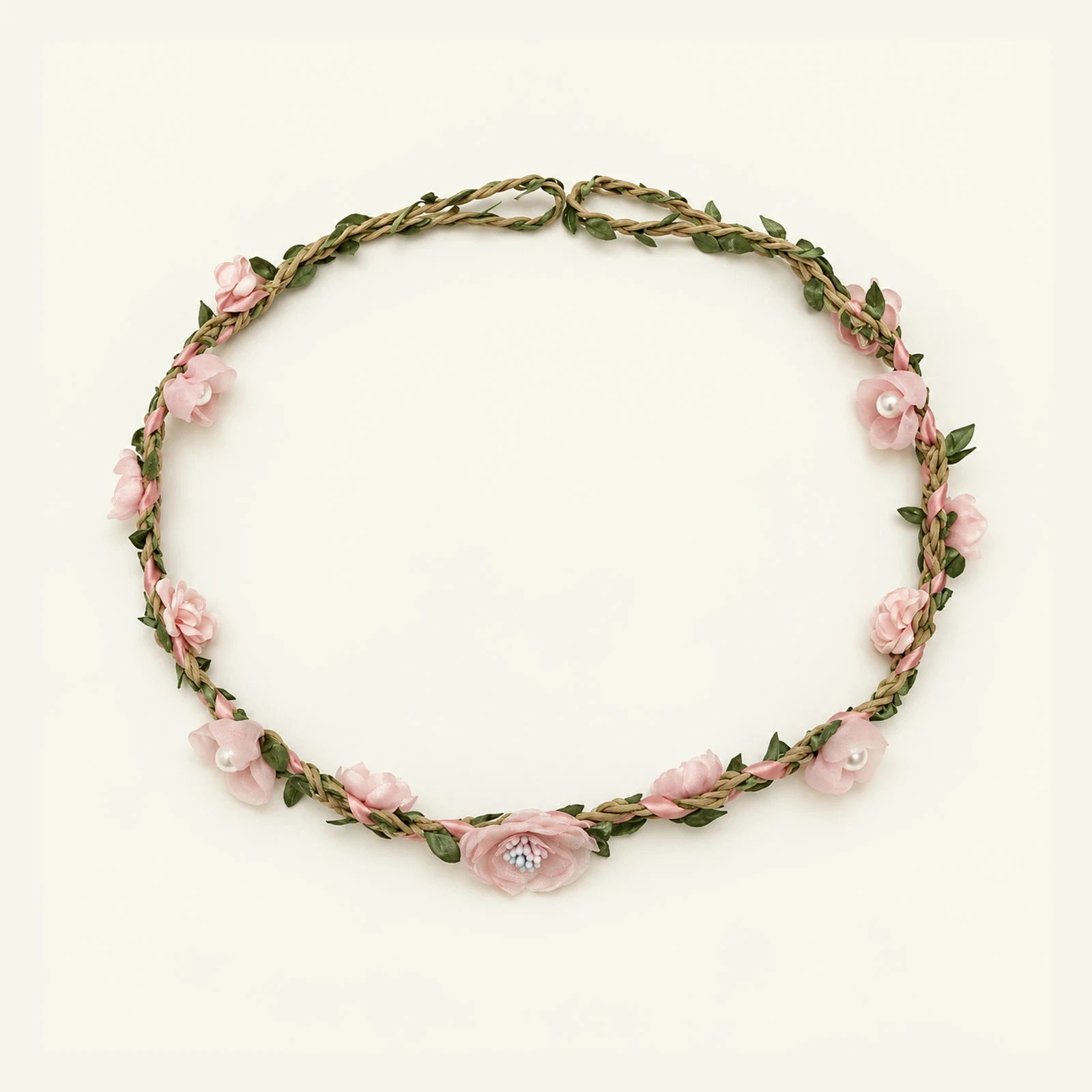 Pink flower and leaf wreath with pearl centers on a white background