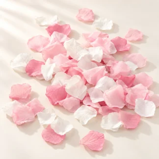A pile of mixed pink and white fabric flower petals