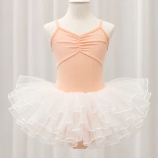 Orange camisole ballet leotard with ruched front and a white layered tutu skirt on a mannequin