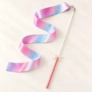 Pink and blue gradient satin ribbon on a white wand with a coral handle and a small cream bow