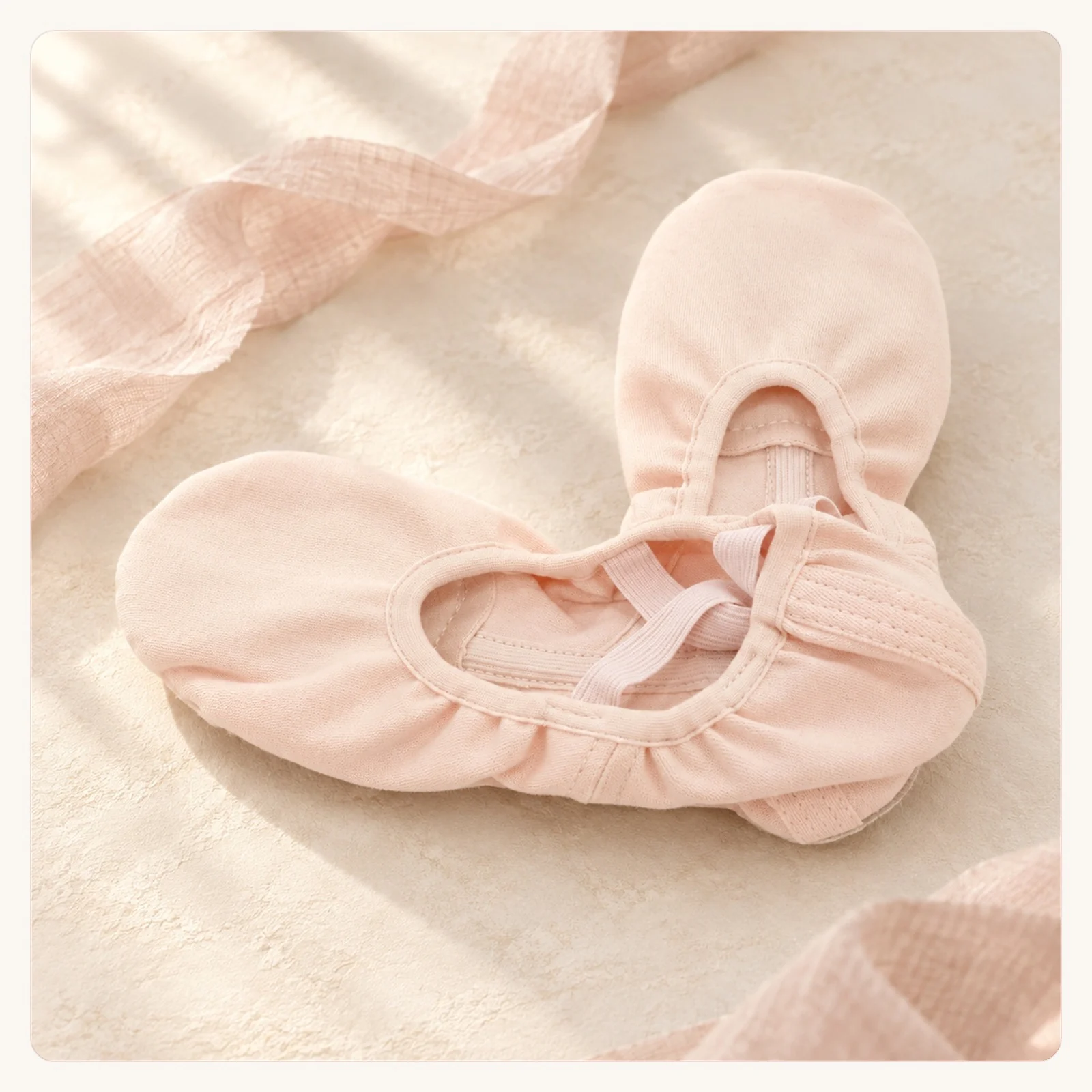Pale pink stretch-canvas ballet slippers with cross elastics
