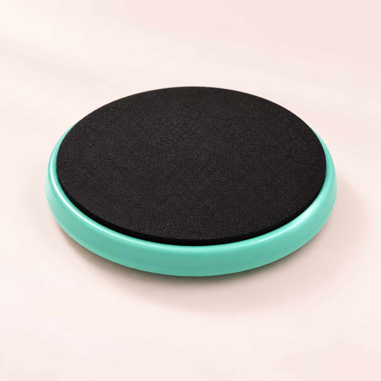 Round ballet pirouette turning discs in pink purple and mint green flat lay